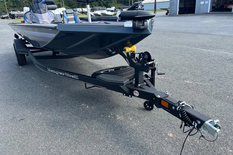 Slide: The Image of 2026 Ranger RT188 boat on trailer, parked on asphalt. - 7