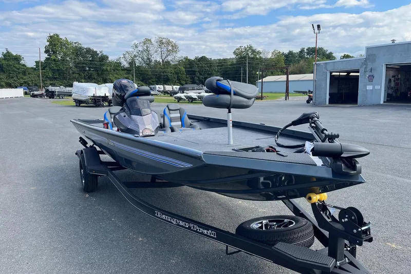Slide: The Image of 2026 Ranger RT188 boat on trailer in outdoor dealership lot. - 8