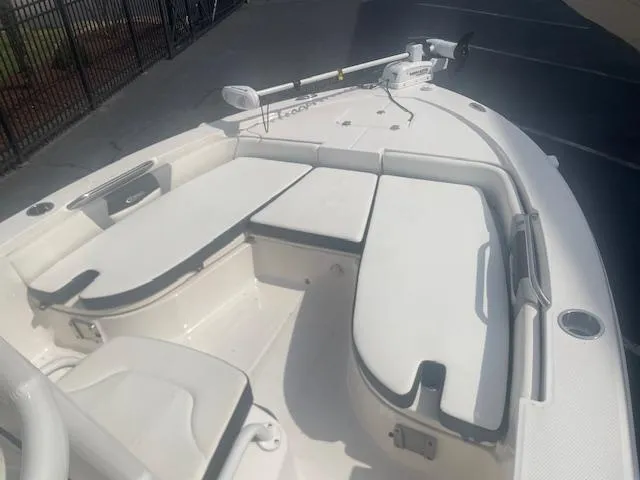 Slide: The Image of 2023 Robalo 206 Cayman boat console with steering wheel and navigation controls. - 5