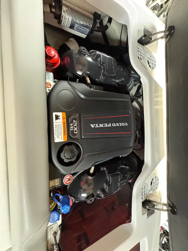 Slide: The Image of Volvo Penta engine in 2021 Regal 1900 ES boat, showcasing V6 200 horsepower. - 6