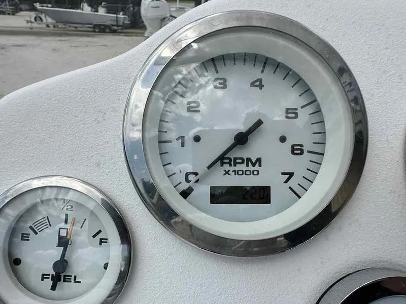 Slide: The Image of Close-up of Kenner 18 CRS 2022 boat RPM and fuel gauges. - 5