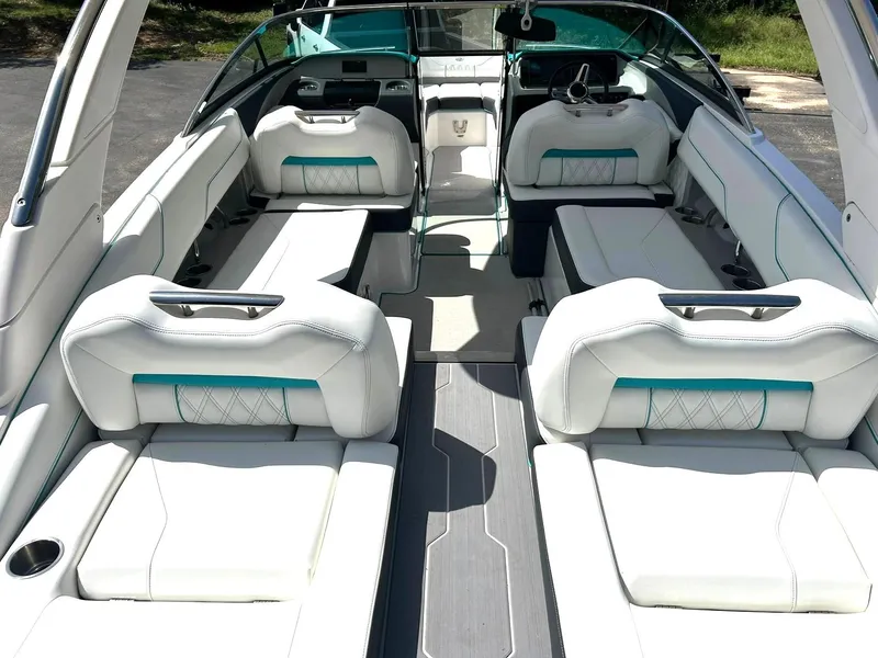 Slide: The Image of 2022 Regal LS4 Surf boat interior with luxurious white seating and modern design. - 37
