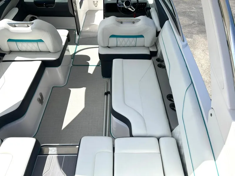 Slide: The Image of 2022 Regal LS4 Surf boat interior with white seating and modern design. - 39
