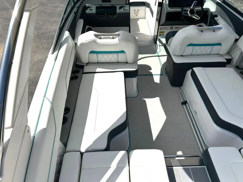 Slide: The Image of 2022 Regal LS4 Surf boat interior with white seating and modern design. - 40