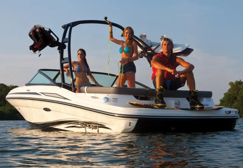 Slide: The Image of Manufacturer Provided Image: 2013 Sea Ray 205 Sport boat with people enjoying water activities. - 12