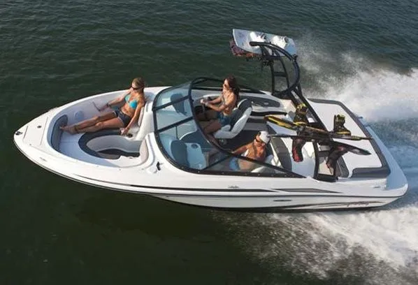 Slide: The Image of Manufacturer Provided Image: 2013 Sea Ray 205 Sport boat cruising on water with passengers. - 13