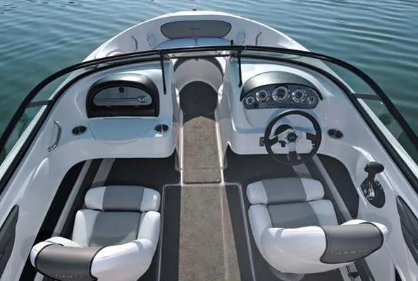 Slide: The Image of Manufacturer Provided Image: 2013 Sea Ray 205 Sport boat interior with steering wheel and seating. - 14