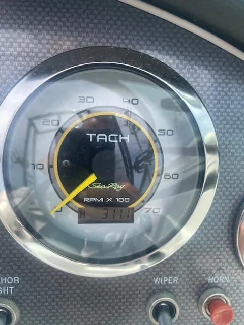 Slide: The Image of Tachometer of 2013 Sea Ray 205 Sport showing 311.1 RPM x 100. - 9