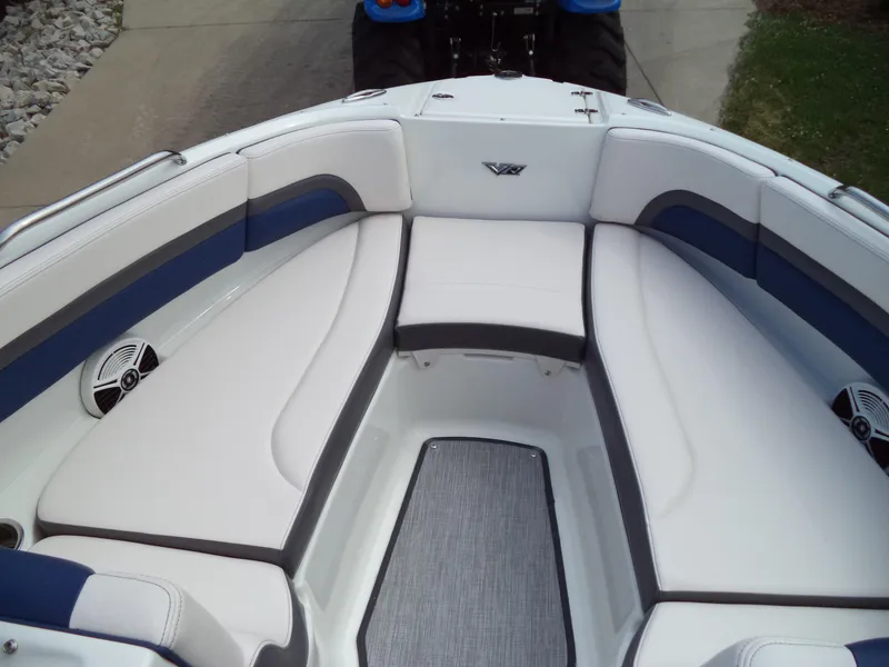 Slide: The Image of 2017 Chaparral Vortex 223 VR boat interior with white and blue seating. - 16