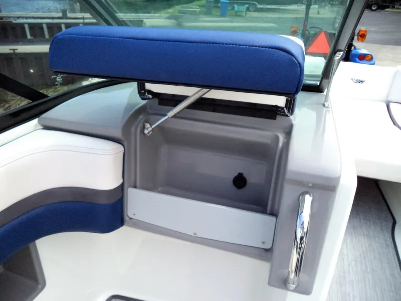 Slide: The Image of 2017 Chaparral Vortex 223 VR boat interior with blue and white seating. - 19