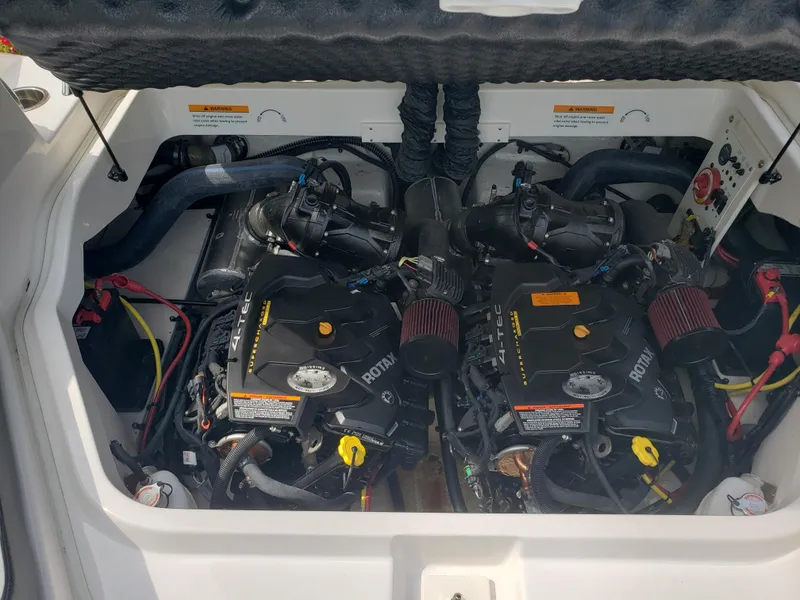 Slide: The Image of 2017 Chaparral Vortex 223 VR engine compartment with dual Rotax engines. - 26