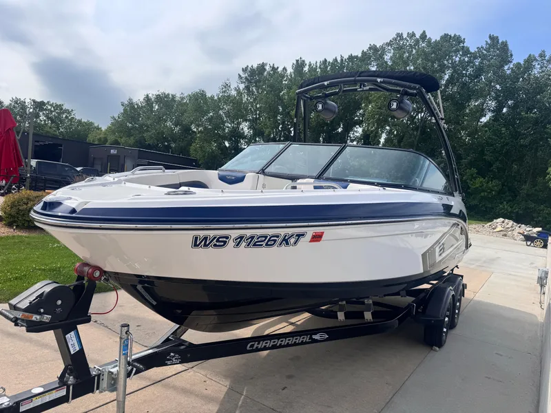 Slide: The Image of 2017 Chaparral Vortex 223 VR boat on trailer, parked outdoors. - 3