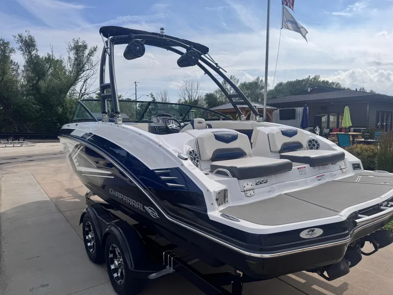 Slide: The Image of 2017 Chaparral Vortex 223 VR boat on trailer, parked outdoors. - 4