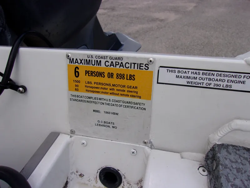 Slide: The Image of 2008 G3 1860 CC Deluxe boat capacity label, maximum 6 persons or 898 lbs. - 11