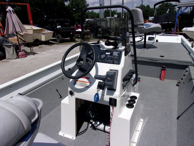 Slide: The Image of 2008 G3 1860 CC Deluxe boat console with steering wheel and controls. - 3