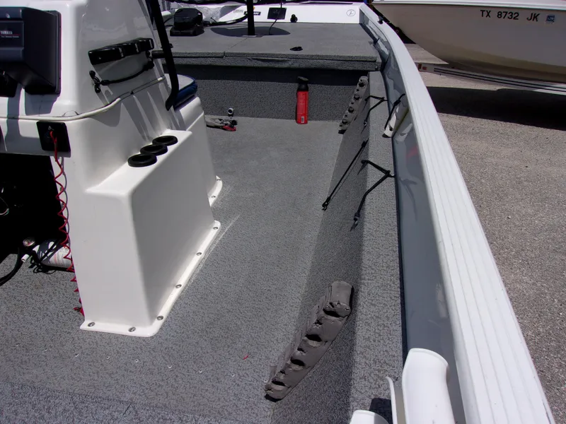 Slide: The Image of 2008 G3 1860 CC Deluxe boat interior with console and storage compartments. - 4