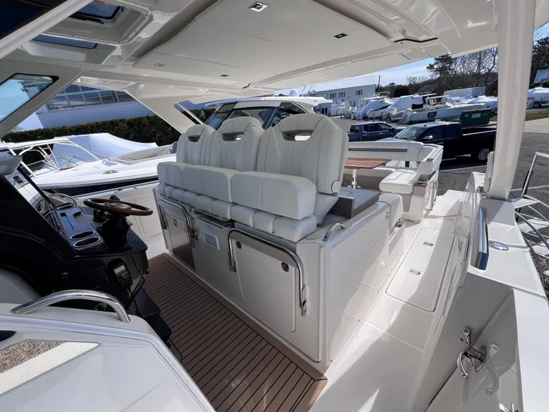 Slide: The Image of 2023 Tiara Yachts 38 LS interior with luxurious seating and modern design. - 12