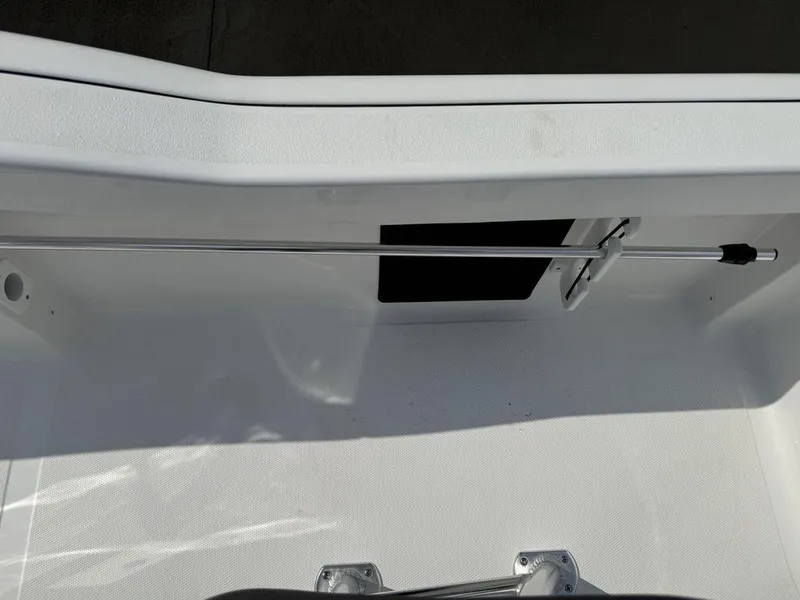 Slide: The Image of 2026 Tidewater 180 CC Adventure boat interior with stainless steel rod holder. - 16