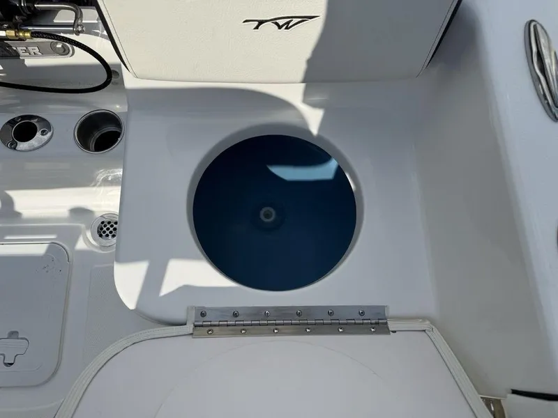 Slide: The Image of Livewell on 2026 Tidewater 180 CC Adventure boat, featuring sleek design and functionality. - 23