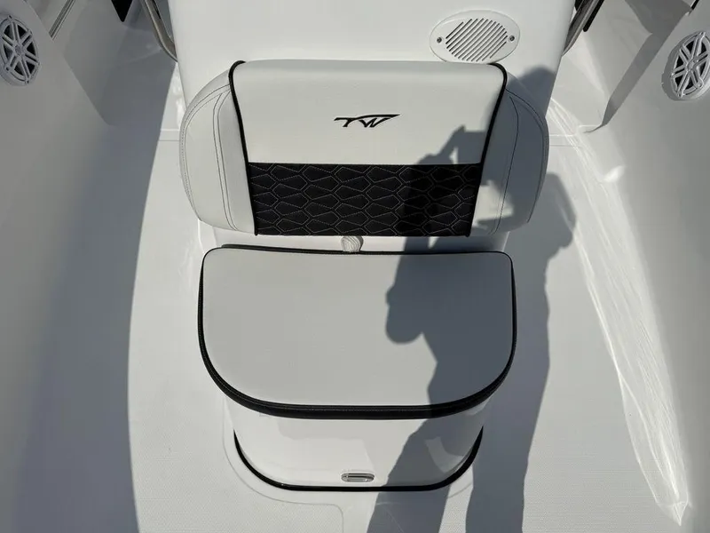 Slide: The Image of 2026 Tidewater 180 CC Adventure boat seat with black and white design. - 7