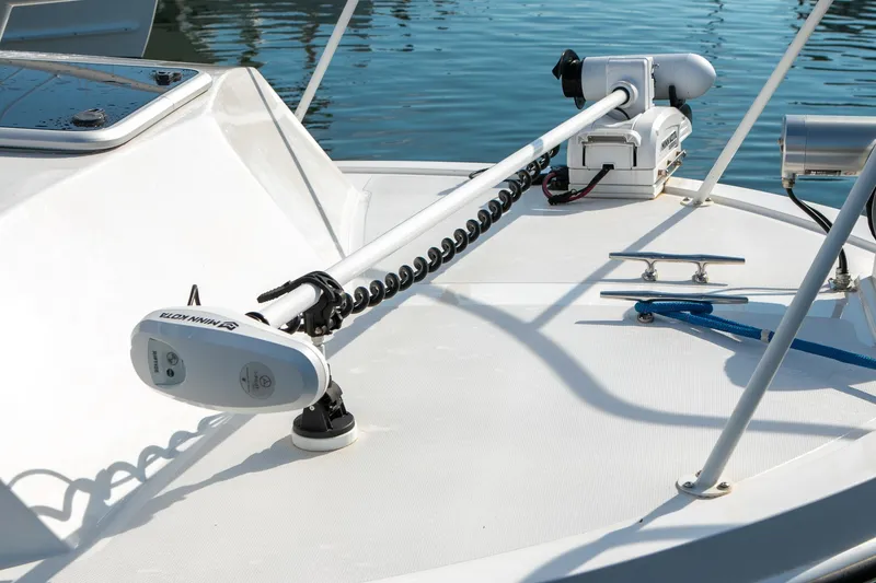 Slide: The Image of 2026 Steiger Craft 31 Miami boat deck with trolling motor and cleats. - 19