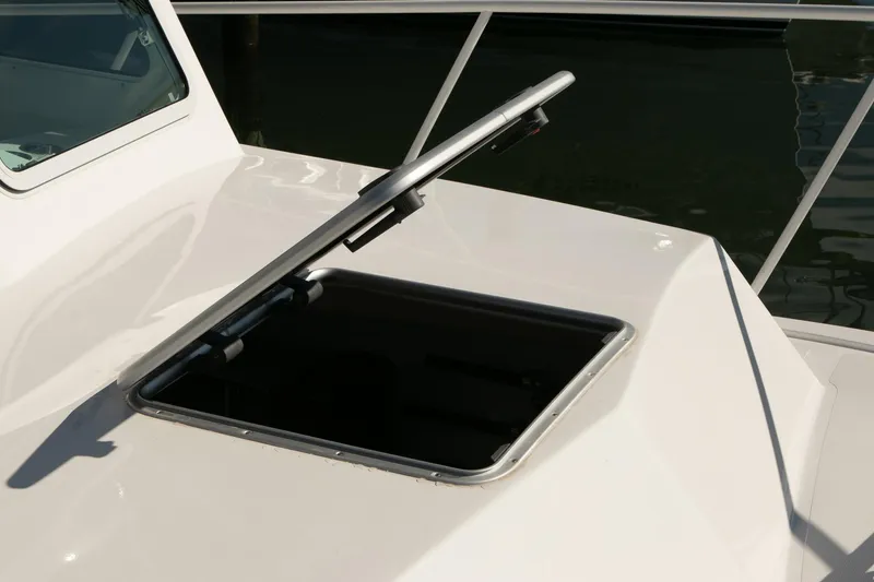 Slide: The Image of Open hatch on 2026 Steiger Craft 31 Miami boat deck. - 21