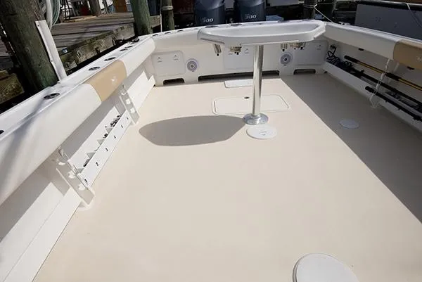 Slide: The Image of 2026 Steiger Craft 31 Miami boat deck with table and seating. - 26