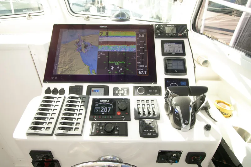 Slide: The Image of Steiger Craft 31 Miami 2026 boat dashboard with advanced navigation and control systems. - 31