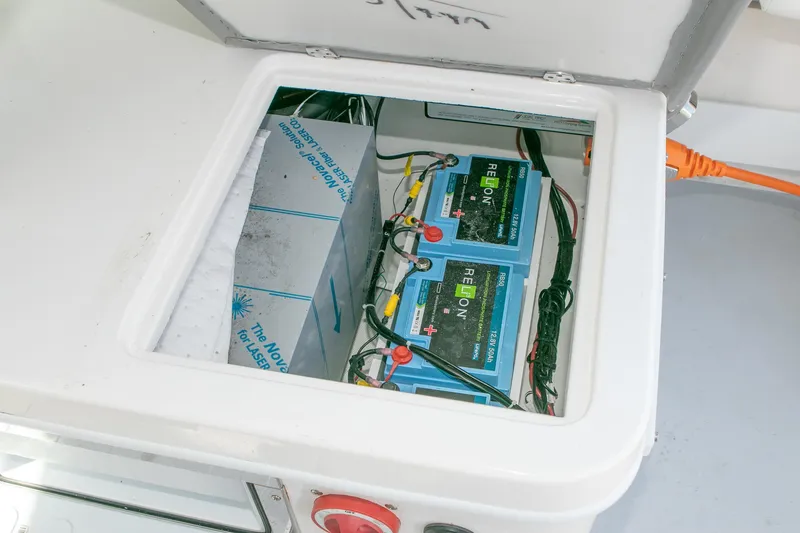Slide: The Image of Battery compartment of 2026 Steiger Craft 31 Miami boat, featuring Relion batteries. - 39