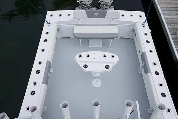 Slide: The Image of 2026 Steiger Craft 31 Miami boat deck with seating and rod holders. - 45