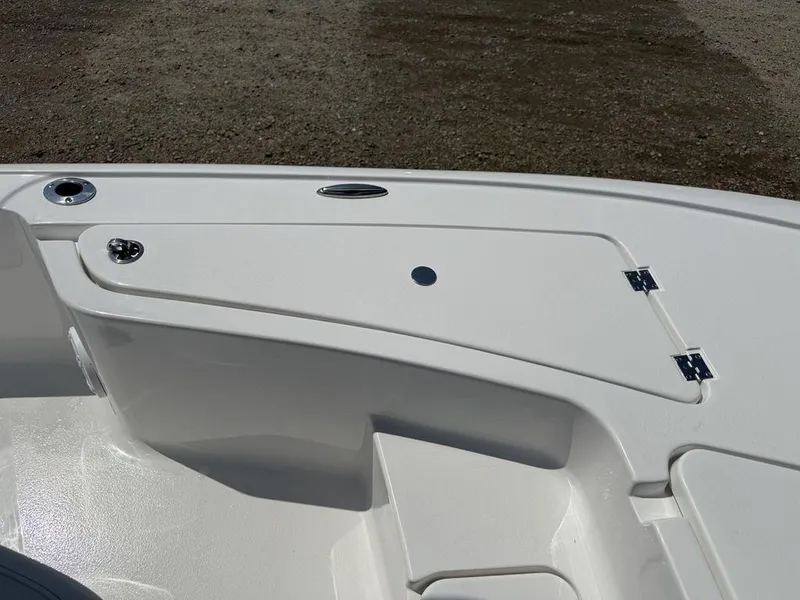 Slide: The Image of 2026 Tidewater 2110 BM boat deck with storage compartment and stainless steel fittings. - 10