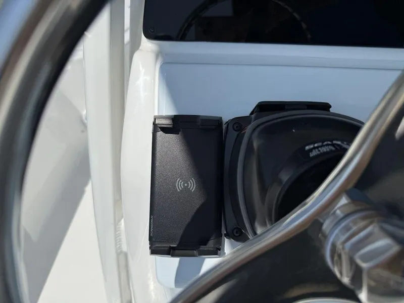 Slide: The Image of Steering wheel and control panel of 2026 Tidewater 2110 BM boat. - 12