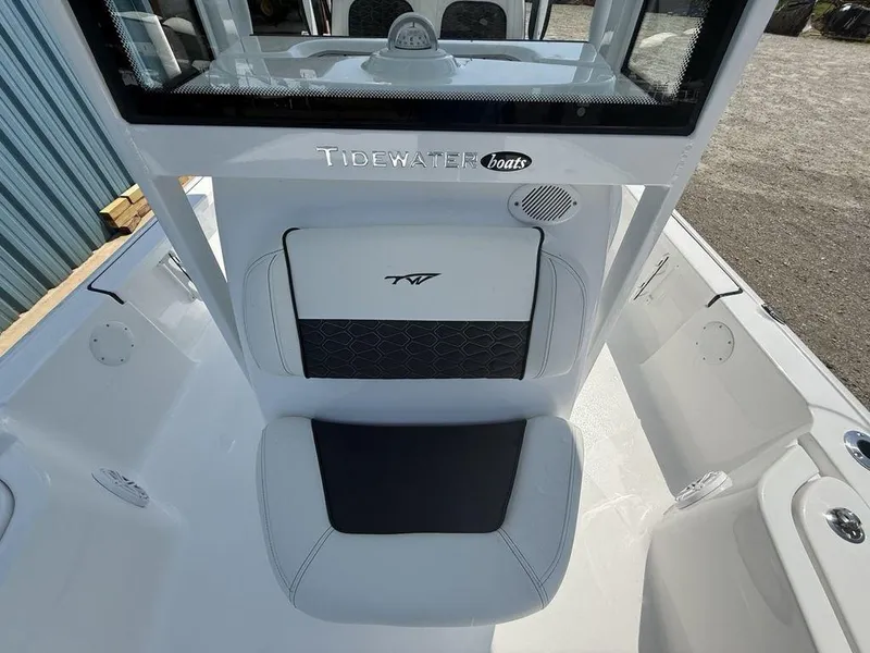 Slide: The Image of 2026 Tidewater 2110 BM boat interior with white and black seating. - 18