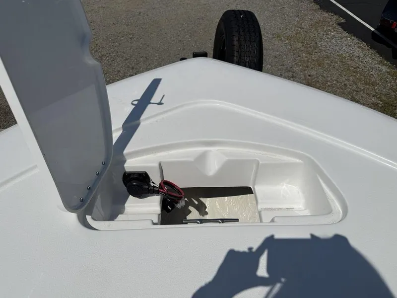 Slide: The Image of Open hatch on 2026 Tidewater 2110 BM boat, showing interior compartment. - 9