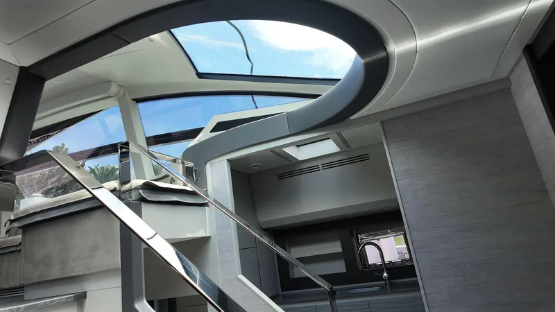 Slide: The Image of Luxurious interior of 2022 Pershing 6X yacht with modern design and skylight. - 17