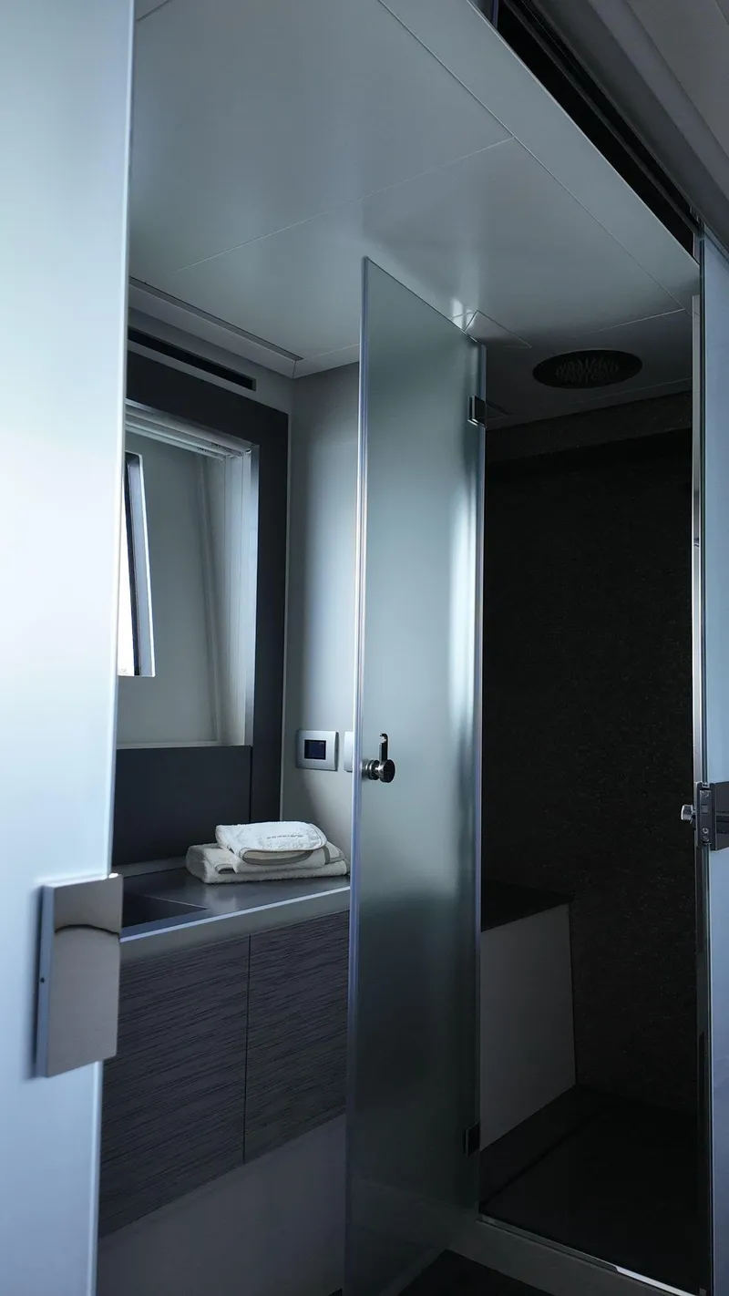 Slide: The Image of Luxurious bathroom interior of 2022 Pershing 6X yacht with modern design elements. - 39