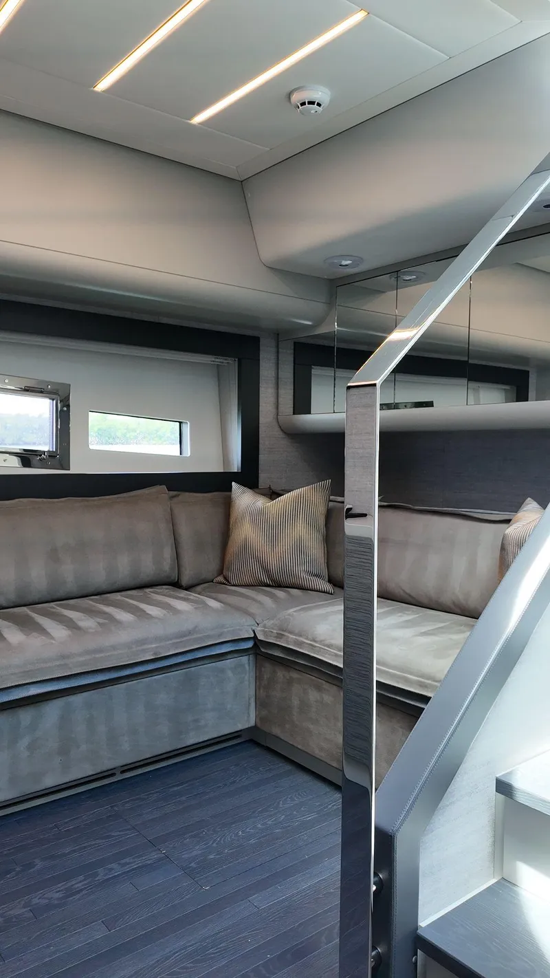 Slide: The Image of Luxurious interior of 2022 Pershing 6X yacht with modern seating and sleek design. - 42