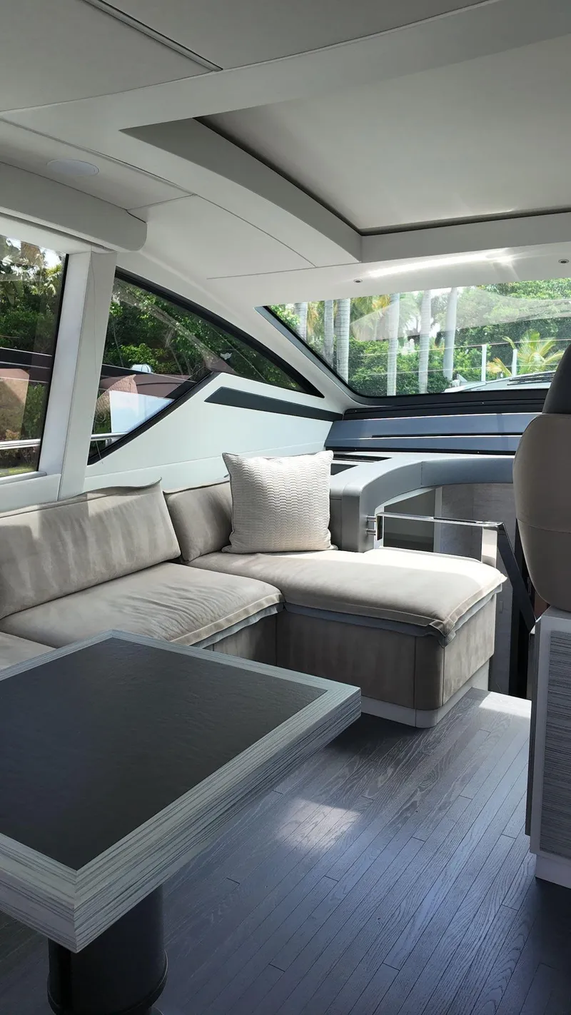 Slide: The Image of Luxurious interior of 2022 Pershing 6X yacht with modern seating and sleek design. - 48