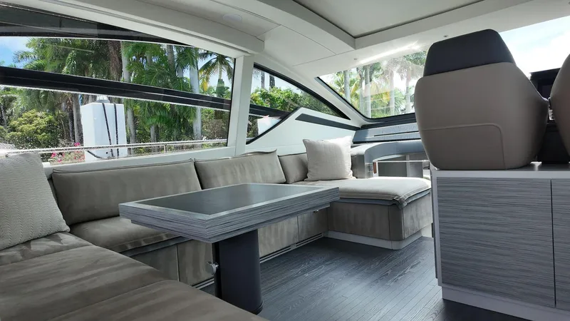 Slide: The Image of Luxurious interior of 2022 Pershing 6X yacht with modern seating and sleek design. - 6