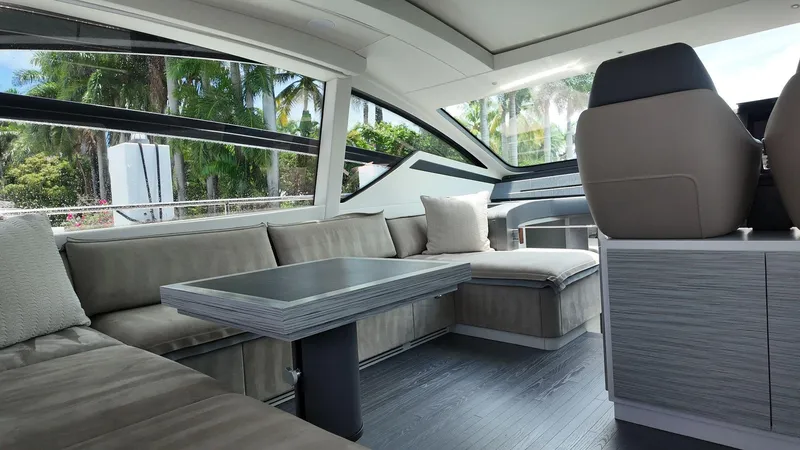 Slide: The Image of Luxurious interior of 2022 Pershing 6X yacht with modern seating and sleek design. - 7