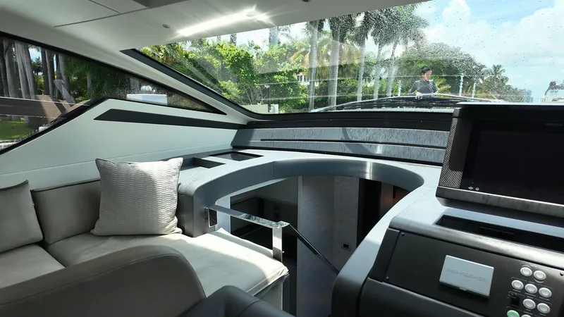 Slide: The Image of Luxurious interior of 2022 Pershing 6X yacht with modern design and panoramic windows. - 8