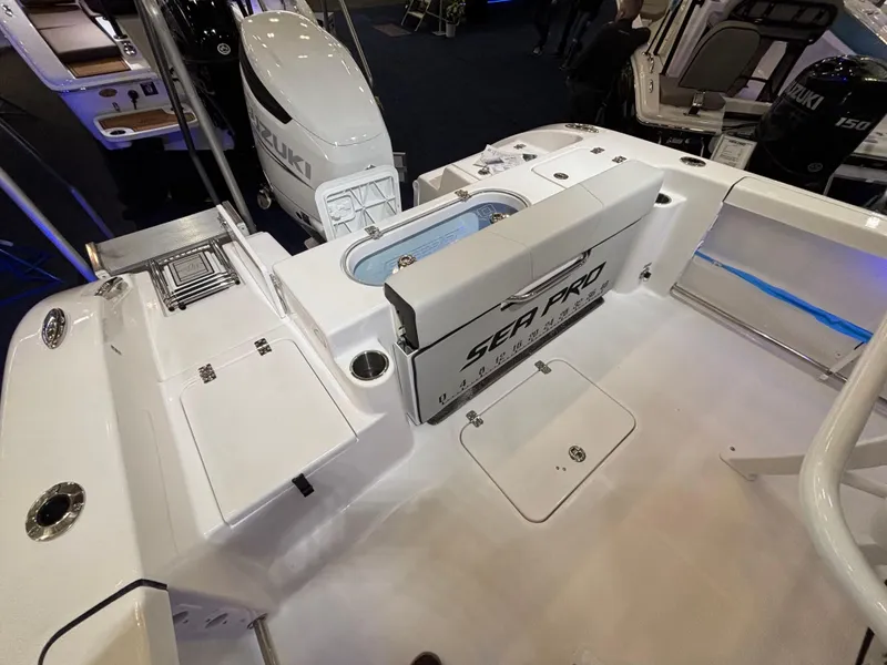 Slide: The Image of 2025 Sea Pro 242 Center Console boat interior with Suzuki engine, showcasing modern design and features. - 5