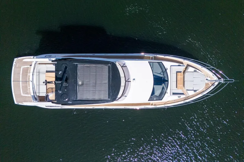 Slide: The Image of Aerial view of 2023 Sunseeker Manhattan 68 Pacific yacht on water. - 13