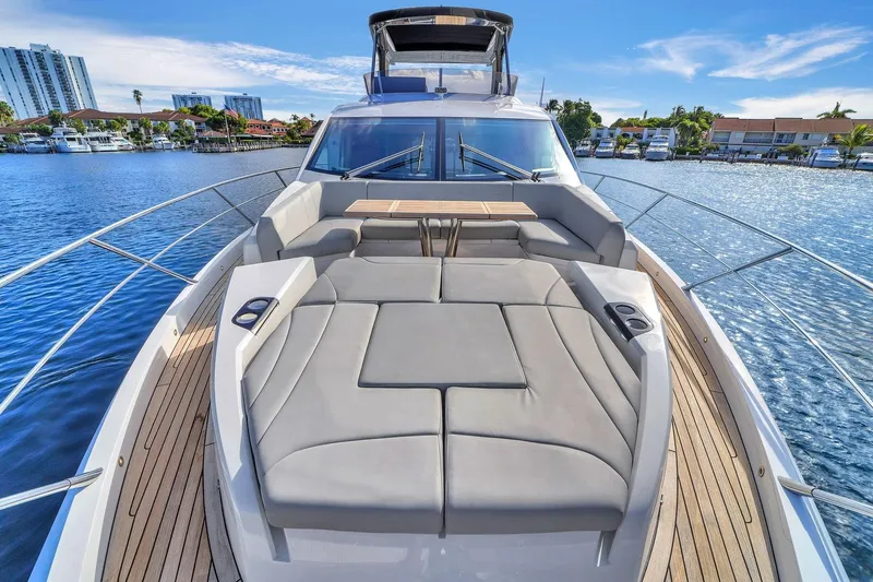 Slide: The Image of Luxurious 2023 Sunseeker Manhattan 68 Pacific yacht with spacious deck and waterfront view. - 18