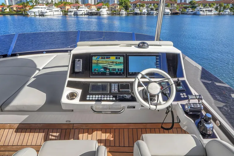 Slide: The Image of Luxurious 2023 Sunseeker Manhattan 68 Pacific yacht helm with advanced navigation systems. - 20