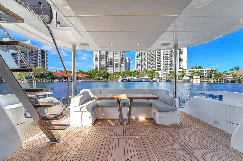 Slide: The Image of Luxurious Sunseeker Manhattan 68 yacht deck with waterfront cityscape view, 2023 model. - 40