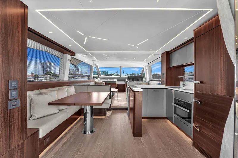 Slide: The Image of Luxurious interior of 2023 Sunseeker Manhattan 68 Pacific yacht with modern kitchen and dining area. - 44