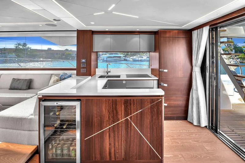 Slide: The Image of Luxurious interior of 2023 Sunseeker Manhattan 68 Pacific yacht with modern kitchen and scenic view. - 47