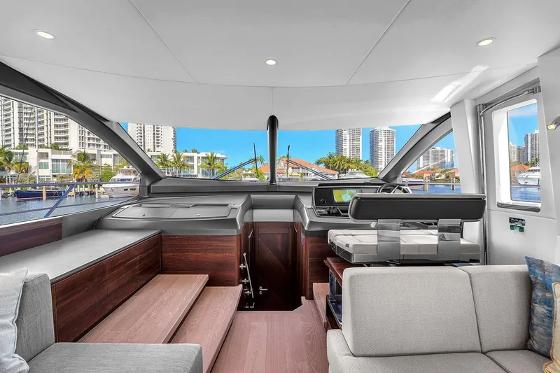 Slide: The Image of Luxurious interior of 2023 Sunseeker Manhattan 68 Pacific yacht with modern helm and seating. - 55