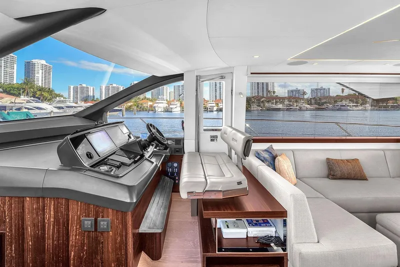 Slide: The Image of Luxurious interior of 2023 Sunseeker Manhattan 68 Pacific yacht with modern helm and seating. - 56